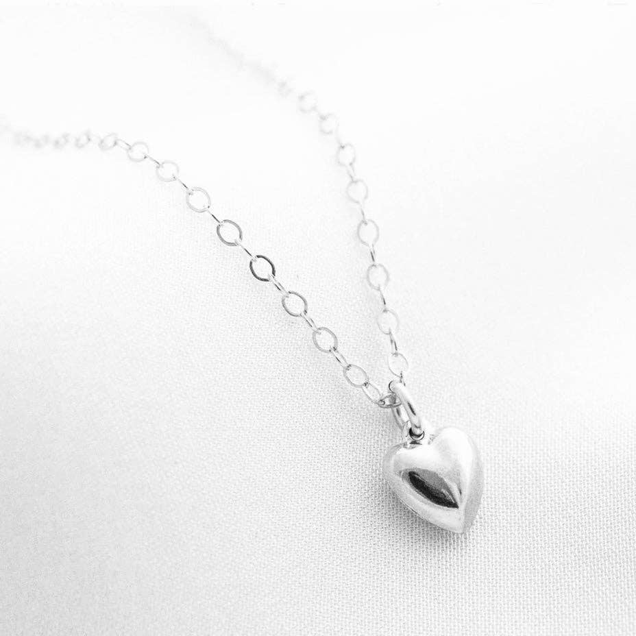 Sterling silver heart pendant necklace, Cara Necklace, on a white background