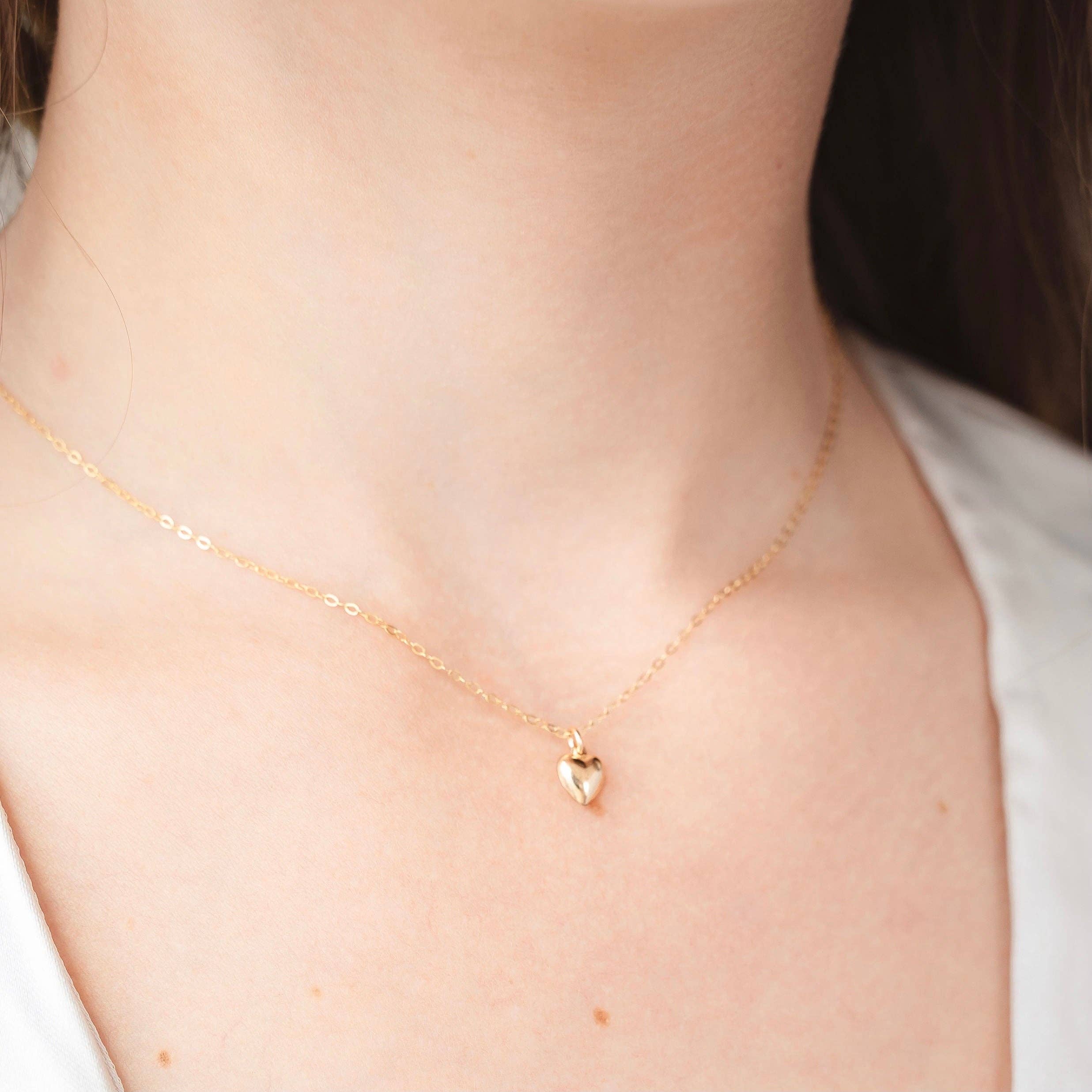 Delicate gold heart pendant necklace, Cara Necklace, worn by a model